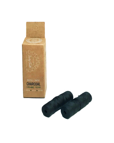 The front of Lucky Teeth Bamboo Charcoal Dental Floss Refills